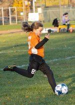 Soccer photo with distracting background